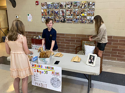 Middle school students hold a fundraiser to support wounded veterans.